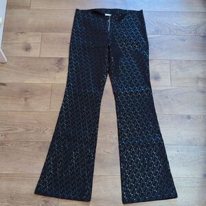 Hailee front zipper flare leg black geometric print L